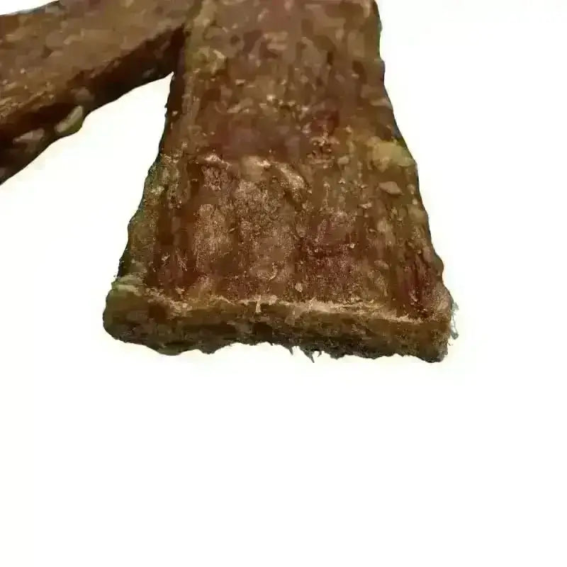 Close-up of a rabbit jerky strip showing the texture
