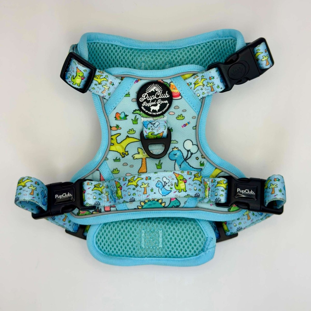 Back view of the Rugged Rover Jurassic Party harness showing handle and buckles