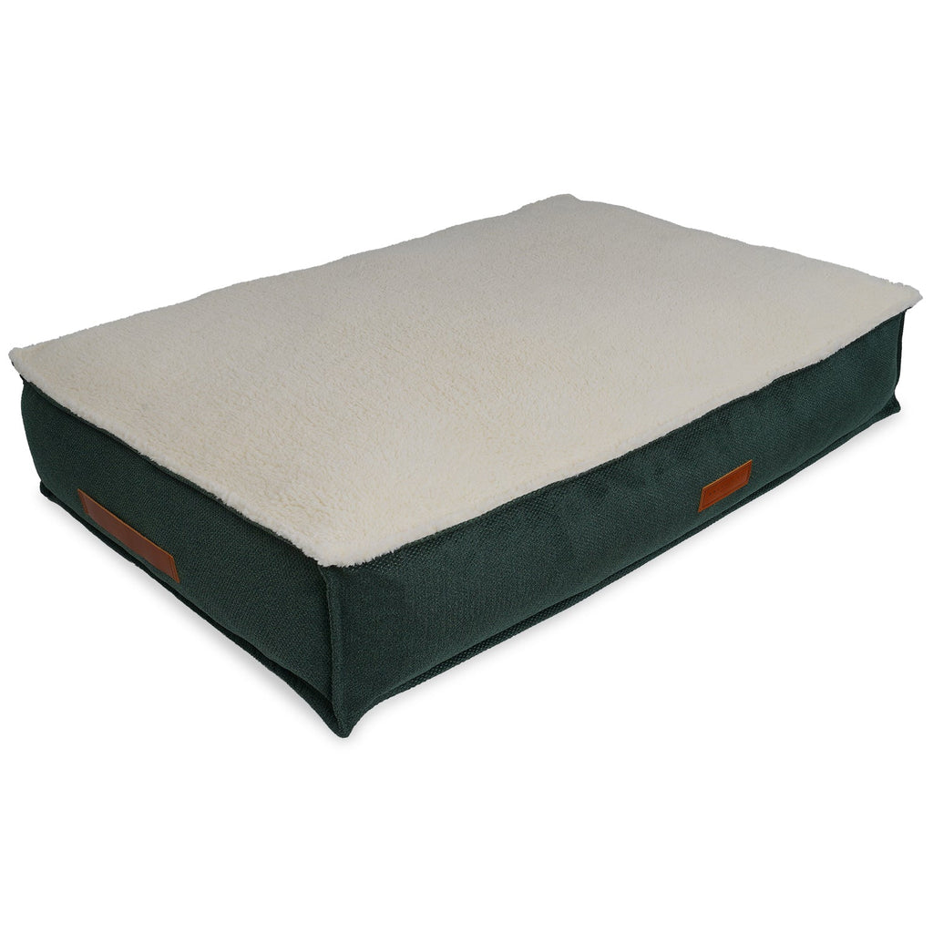 Richmond green sherpa pillow dog bed shown at an angle