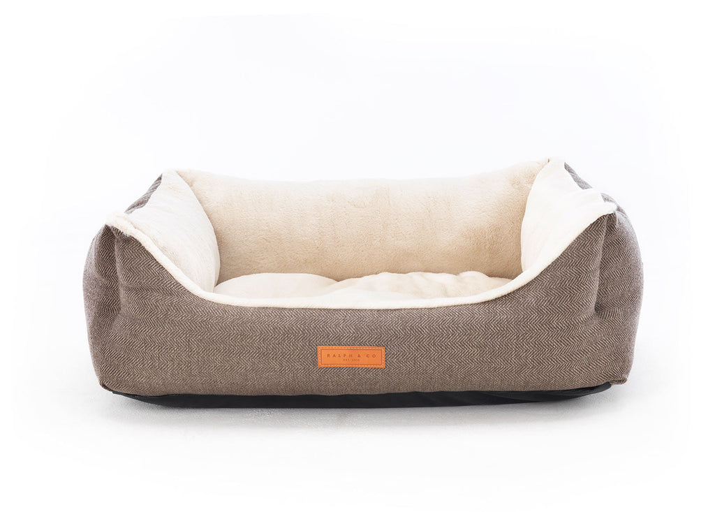 Lincoln brown herringbone tweed bolster dog bed with cream faux fur lining