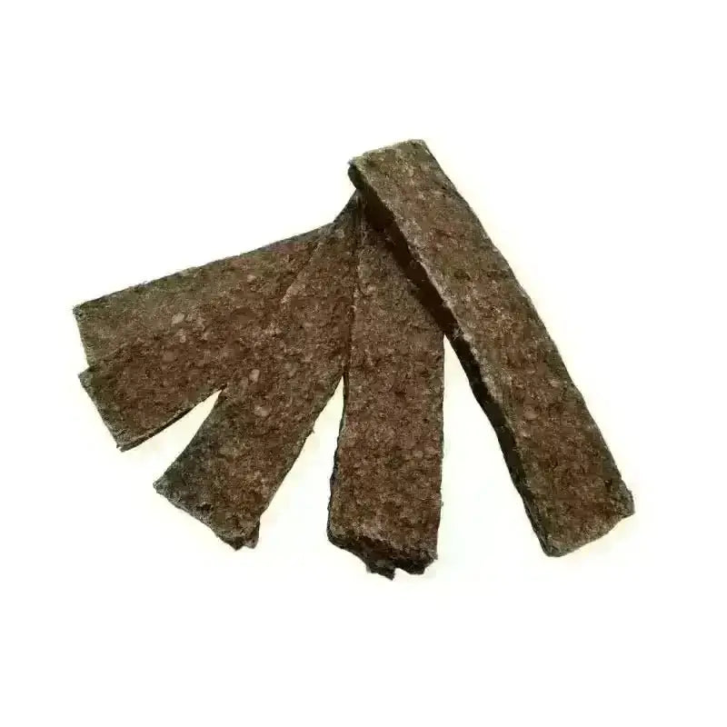 Five flat venison jerky strips fanned out on white
