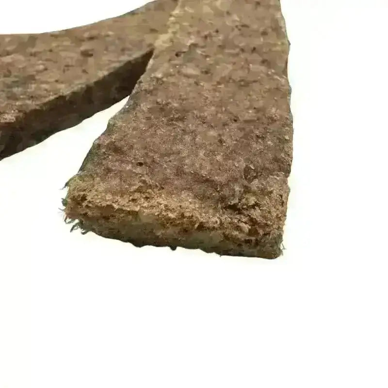 Close-up of a venison jerky strip showing the texture