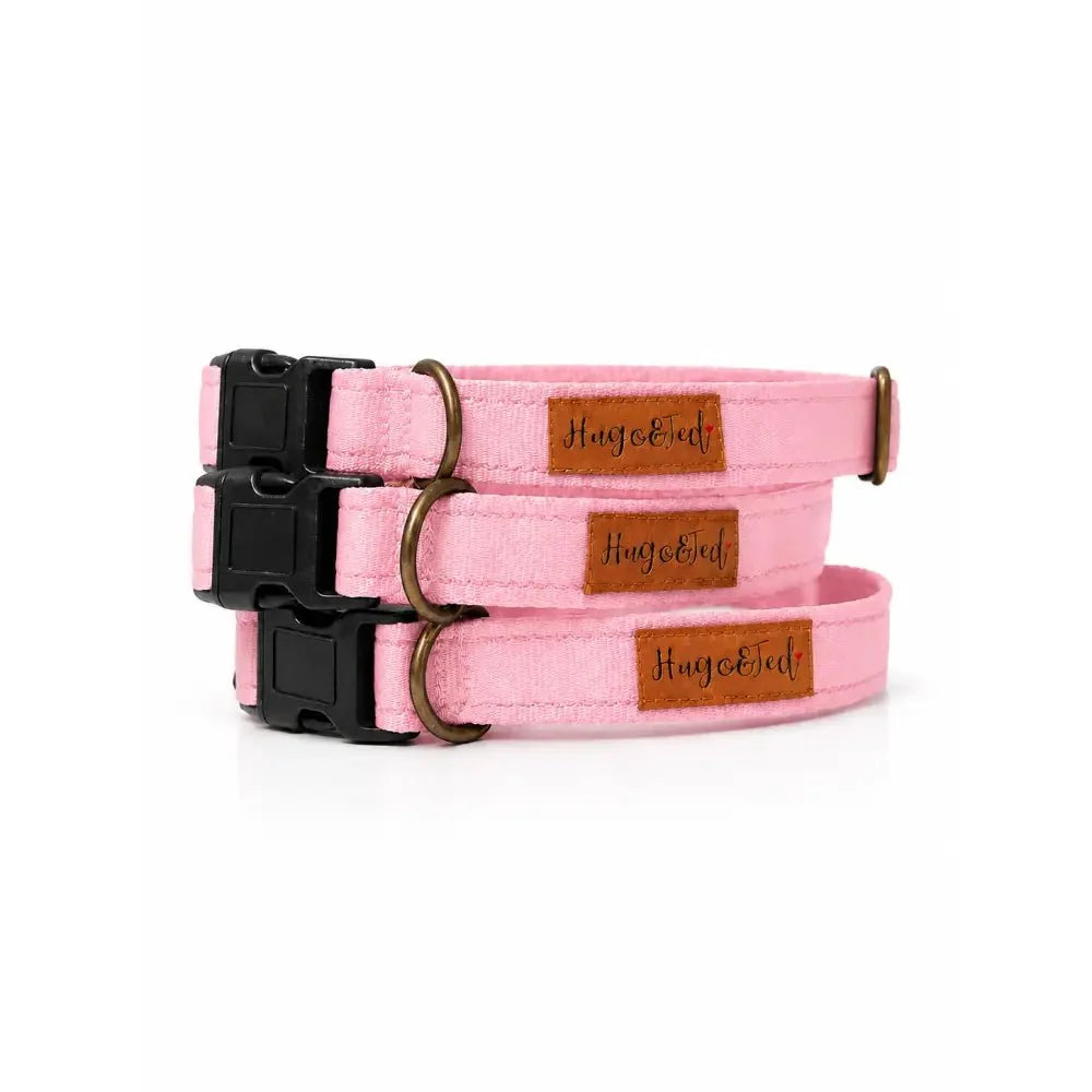Three baby pink Waterproof Dog Collars with black plastic buckles